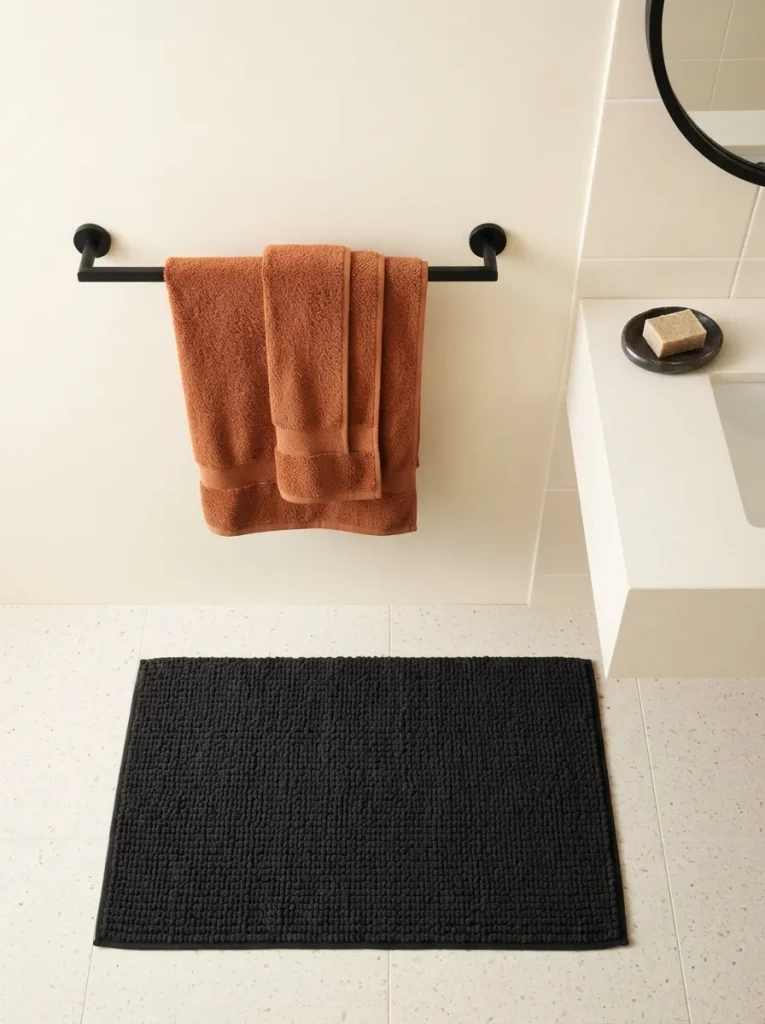 Layering Black and Burnt-Orange Textiles